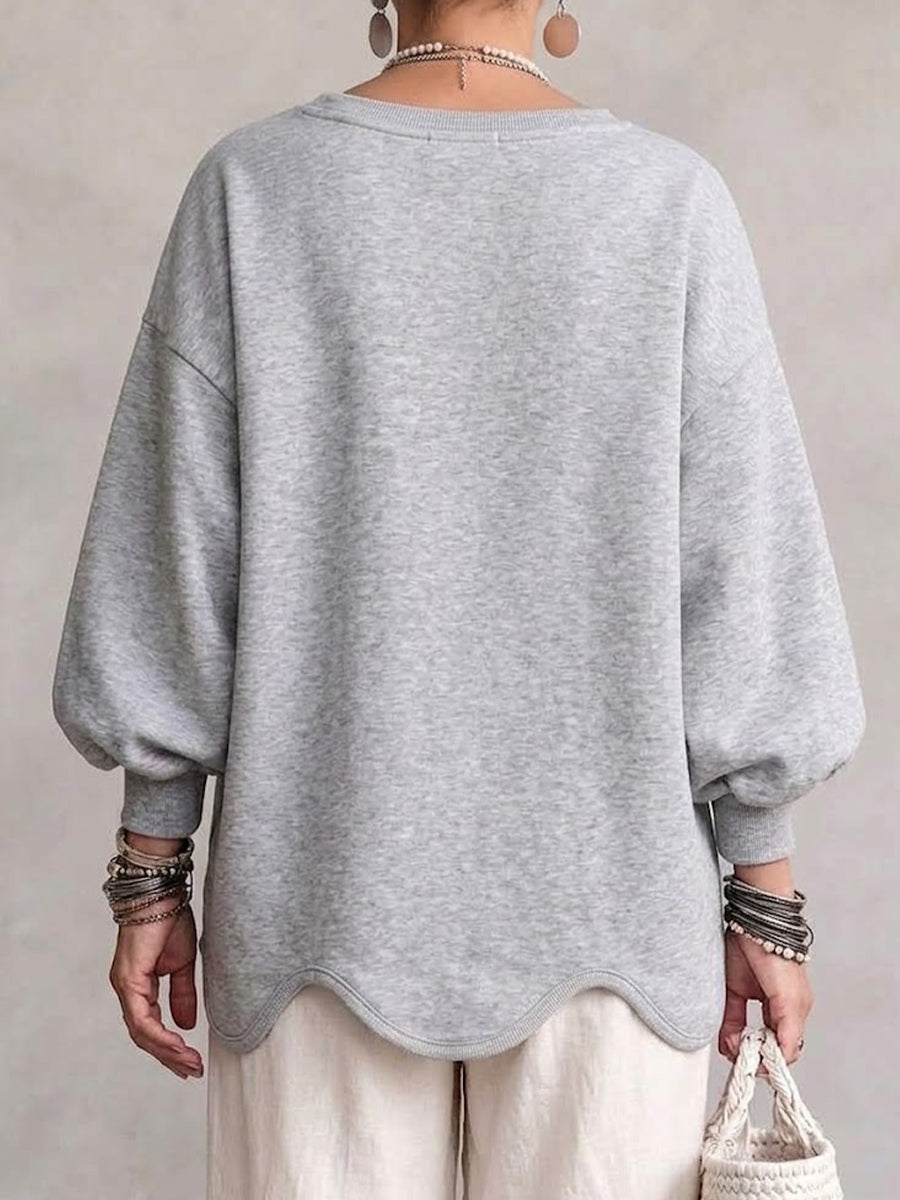 Sudadera oversize de bajo ondulado